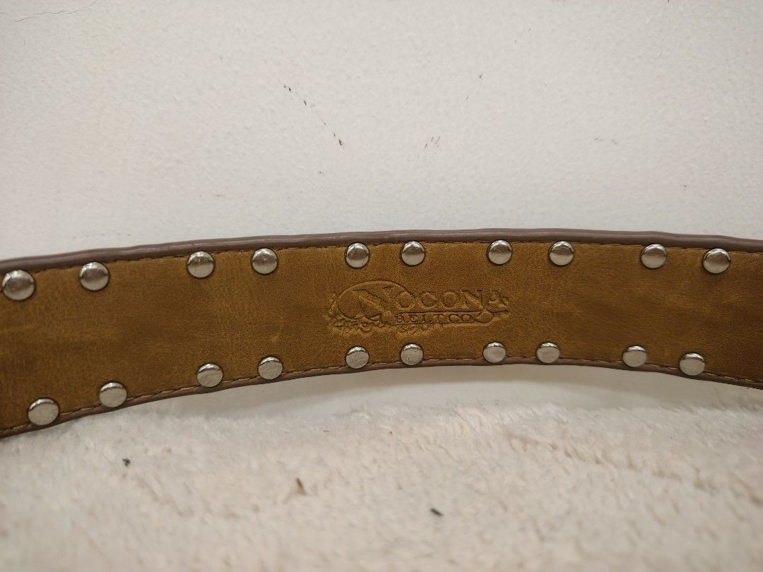 Brown Western Rhinestone Heart Belt (Category: Belts) located in La Trinidad. Submitted by padasem_kadi (Listing ID 1448771023, Image 3). Description: - Brown leather belt - Rhinestone and colorful heart details - Large, ornate buckle - Belt length: 36.5 inches - Fits waistlines: 28-32 inches - Studded details all around - Perfect statement accessory.