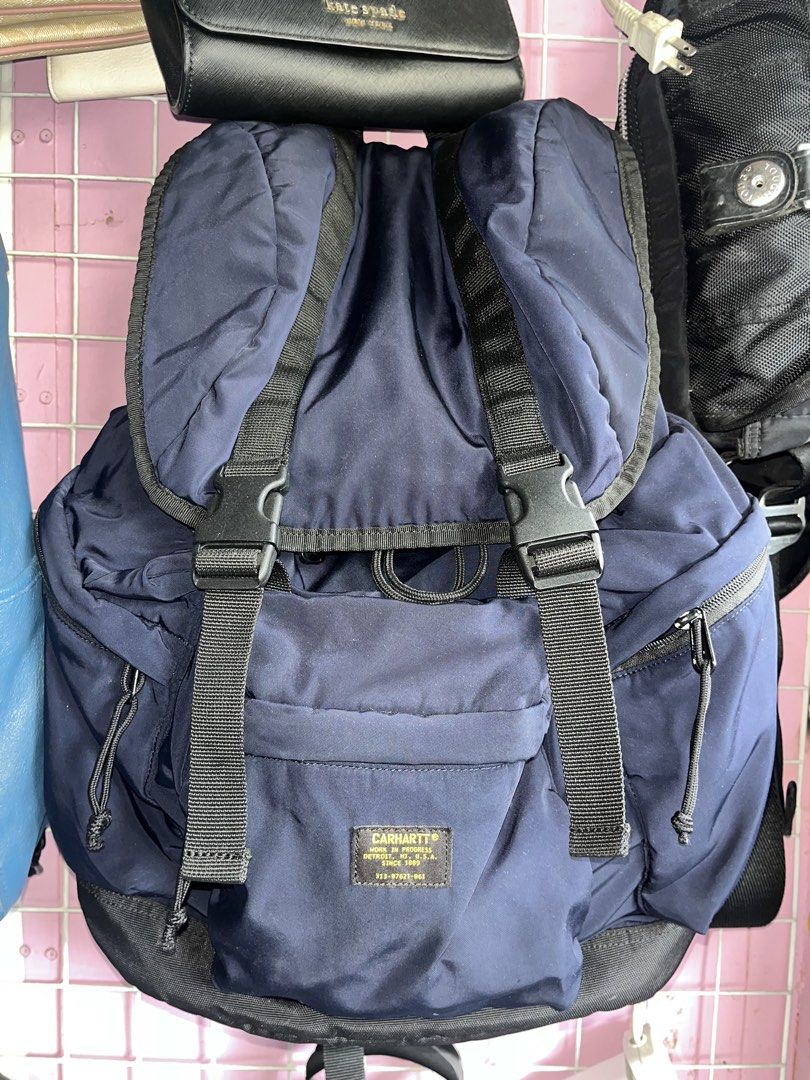 Carhartt Navy Blue Backpack (Category: Backpacks) located in Carmen. Submitted by by_your_stuff (Listing ID 1448727734, Image 1). Description: - Navy blue Carhartt backpack - Main compartment with drawstring and buckle closure - Front zip pocket for easy access - Adjustable padded shoulder straps - Durable material, perfect for everyday use or travel 2800 pm for more info.