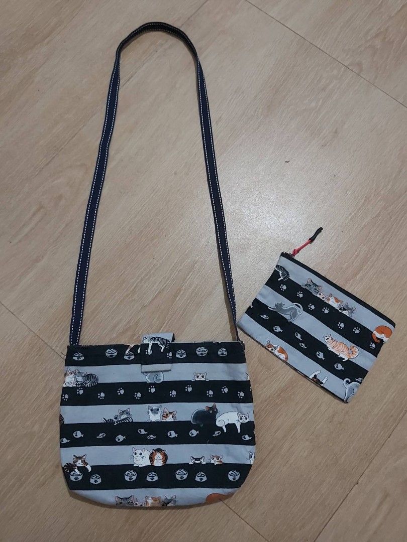 CATS SLING BAG & POUCH SET (Category: Cross-body Bags) located in Bulacan. Submitted by nansantiago (Listing ID 1448883821, Image 1). Description: CATS SLING BAG & POUCH SET Sling bag: 10x7x1.5" inches Pouch: 7x5" inches 🏷️ ₱170 set‼️ 📍 Location: Plaridel, Bulacan 💸 Mode of Payments: Gcash / BPI 📦 Pick-up / Ship 🚚 Couriers : Flash Express / SPX / Lalamove.