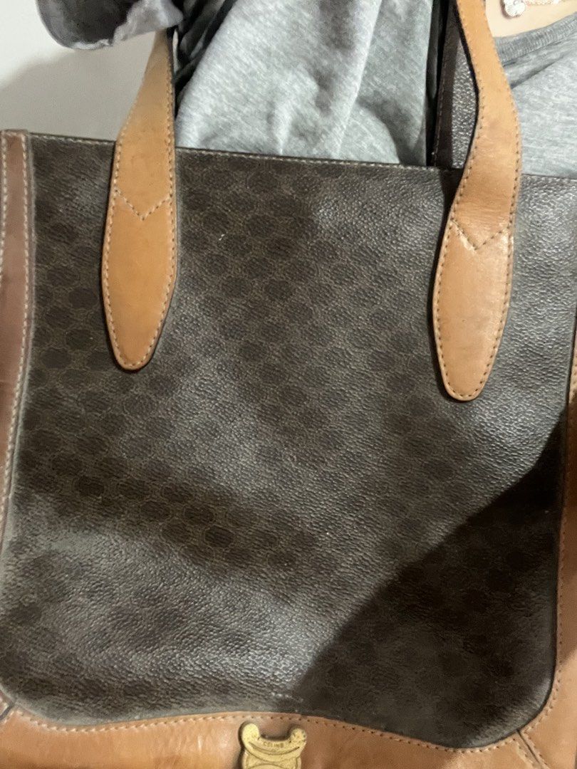 Celine Macadam Canvas Leather Tote Bag (Category: Luxury Bags & Wallets) located in Manila. Submitted by jaisailove68397 (Listing ID 1448844275, Image 1). Description: - Iconic Celine Macadam print - Tan leather trim - Multiple interior pockets for organization - Straps show some wear - Great vintage piece for everyday use - Bag has been used May issue po pagawa nio nlang po d ko nagagamit .