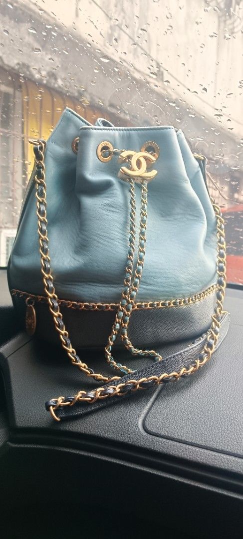Chanel Blue Leather Chain Bucket Bag (Category: Luxury Bags & Wallets) located in Legazpi City. Submitted by georgepineda791 (Listing ID 1448810729, Image 3). Description: ✨ Preloved Chanel CC Lovely Bucket Bag A timeless and elegant Chanel bucket bag featuring a beautiful two-tone design—light blue on the upper part and navy blue on the lower and bottom part. It is accented with gold-tone hardware and chain straps, adding a classic and luxurious