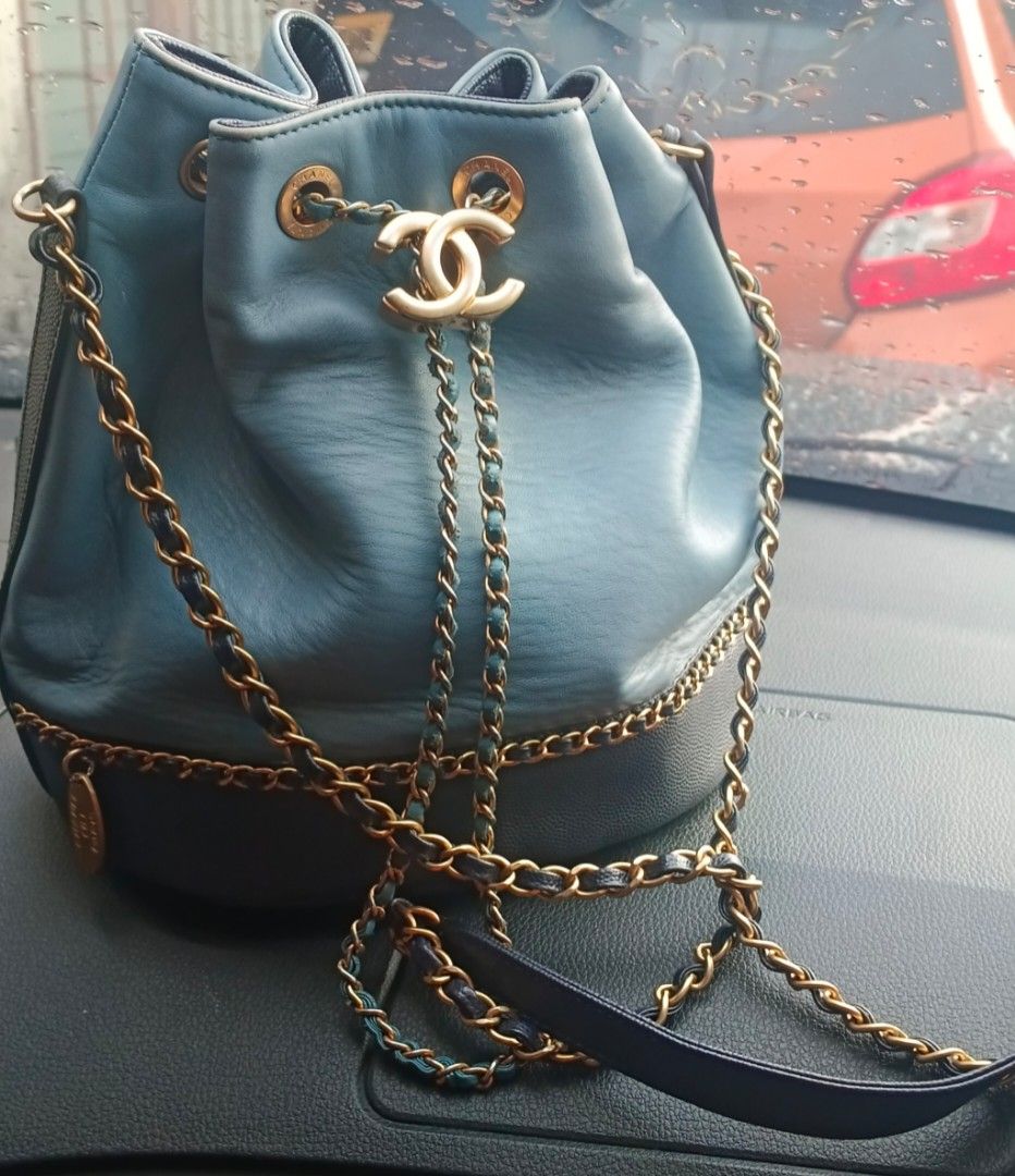 Chanel Blue Leather Chain Bucket Bag (Category: Luxury Bags & Wallets) located in Legazpi City. Submitted by georgepineda791 (Listing ID 1448810729, Image 1). Description: ✨ Preloved Chanel CC Lovely Bucket Bag A timeless and elegant Chanel bucket bag featuring a beautiful two-tone design—light blue on the upper part and navy blue on the lower and bottom part. It is accented with gold-tone hardware and chain straps, adding a classic and luxurious