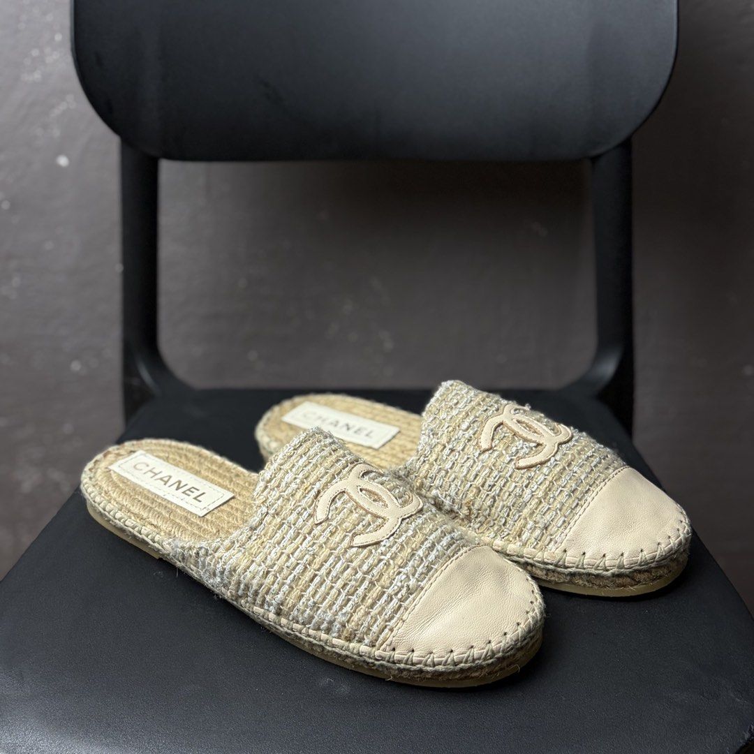 Chanel Espadrille Mule Slip on Flats (Category: Sneakers & Footwear) located in Manila. Submitted by yourtherapist_ (Listing ID 1448746425, Image 1). Description: Chanel Espadrille Mule Slip on Flats Size 39 womens No flaws No inclusions Like new Authentic Slip-on mule flats with a traditional jute-wrapped sole Tweed with leather detailing on the cap toe and logo 6,000.