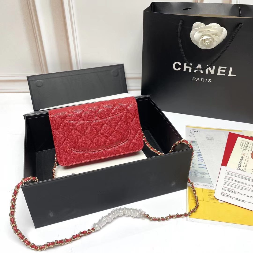 Chanel Red Caviar Wallet on Chain (Category: Luxury Bags & Wallets) located in Muntinlupa City. Submitted by fuzetarhub95690 (Listing ID 1448774478, Image 2). Description: - Classic Chanel Wallet on Chain (WOC) - Vibrant red caviar leather - Elegant gold hardware - Ample card slots and interior zip pocket - Comes with original box and authenticity card - Ideal for evening wear or as a chic clutch.