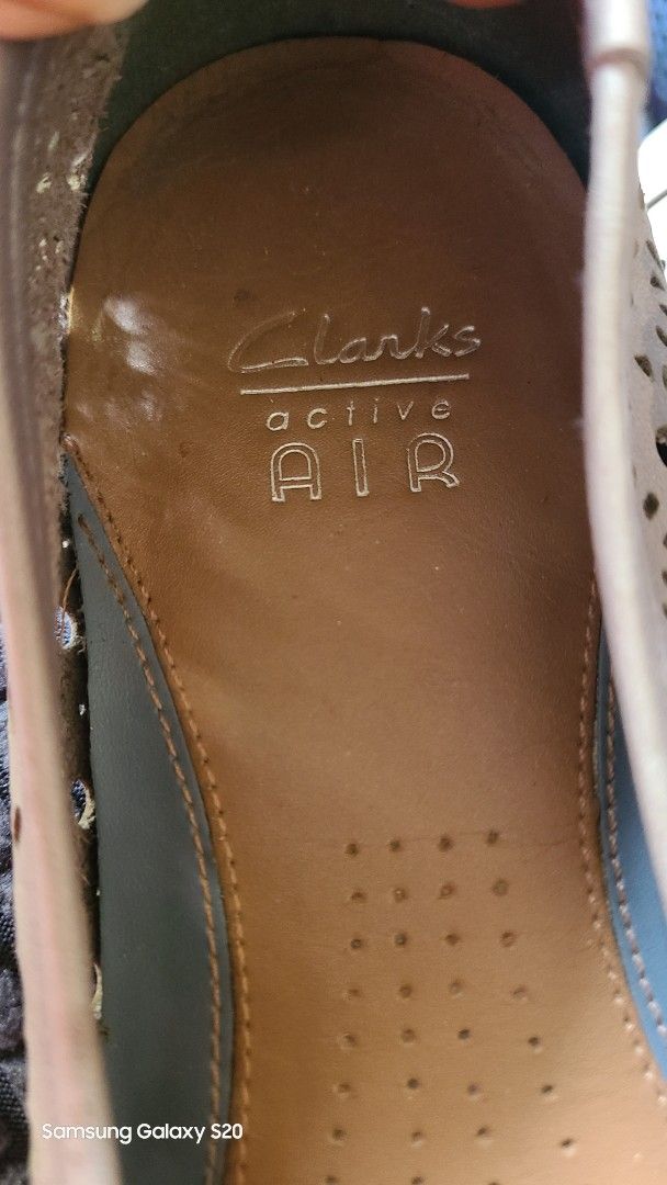 Clarks Active Air White Laser Cut Ballet Flats (Category: Flats & Sandals) located in Mandaluyong City. Submitted by Michkam021 (Listing ID 1448716245, Image 2). Description: - White Clarks ballet flats - Elegant laser cut details - Comfortable and breathable design - Features Active Air cushioning for all-day comfort - Unique floral pattern on the sole - Ideal for everyday wear - Note: Minor marks present on the inside heel area.