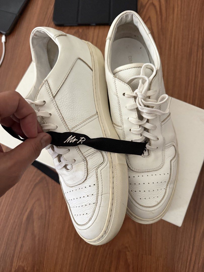 COMMON PROJECTS BBALL LOW AUTHENTIC (Category: Sneakers) located in Muntinlupa City. Submitted by king_declutter (Listing ID 1448698275, Image 3). Description: FOR SALE: AUTHENTIC COMMON PROJECTS BBALL LOW SIZE: 42 but fits like 10.5US COLOR: WHITE CONDITION: 8/10 or better NEEDS CLEANING PURCHASED ONLINE FROM MR. PORTER RFS: DECLUTTERING .