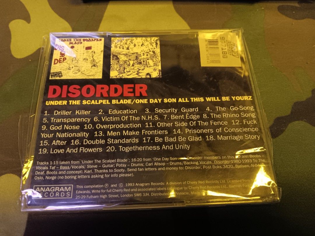 Disorder Under The Scalpel Blade / One Day Son All This Will Be Yourz CD (Category: CDs & DVDs) located in Kuching. Submitted by hvyslvtg (Listing ID 1448730646, Image 2). Description: - Disorder CD: 'The Punk Collectors Series' edition. - Combines two LPs: 'Under The Scalpel Blade' and 'One Day Son All This Will Be Yourz' onto one CD. - Features tracks such as Driller Killer, Education, and Security Guard. - Released by Anagram Records in 1993..