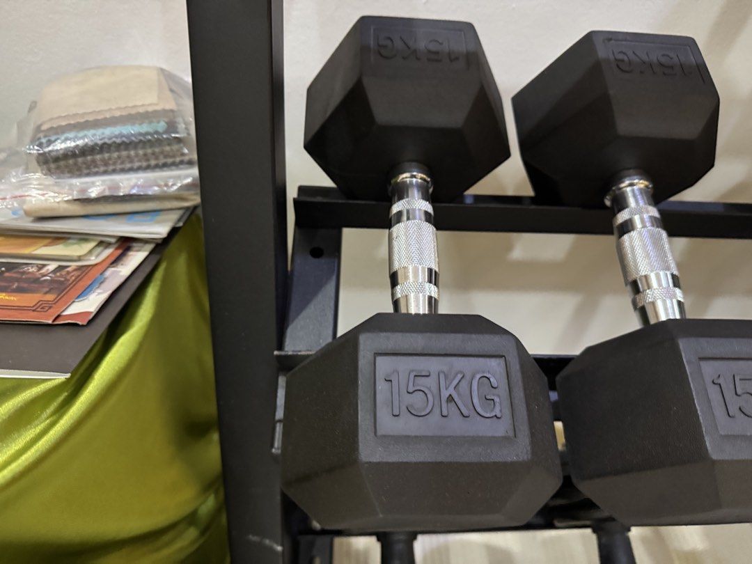 Dumbbell Rack (Category: Other Sports Equipment and Supplies) located in Kuala Lumpur. Submitted by khaiyuen98 (Listing ID 1448840947, Image 3). Description: - Sturdy black metal dumbbell rack - Multiple tiers for organized storage - Suitable for various dumbbell sizes and types - Helps keep your home gym tidy and accessible - Durable construction 98cm Width x 50cm Length x 93cm Height.