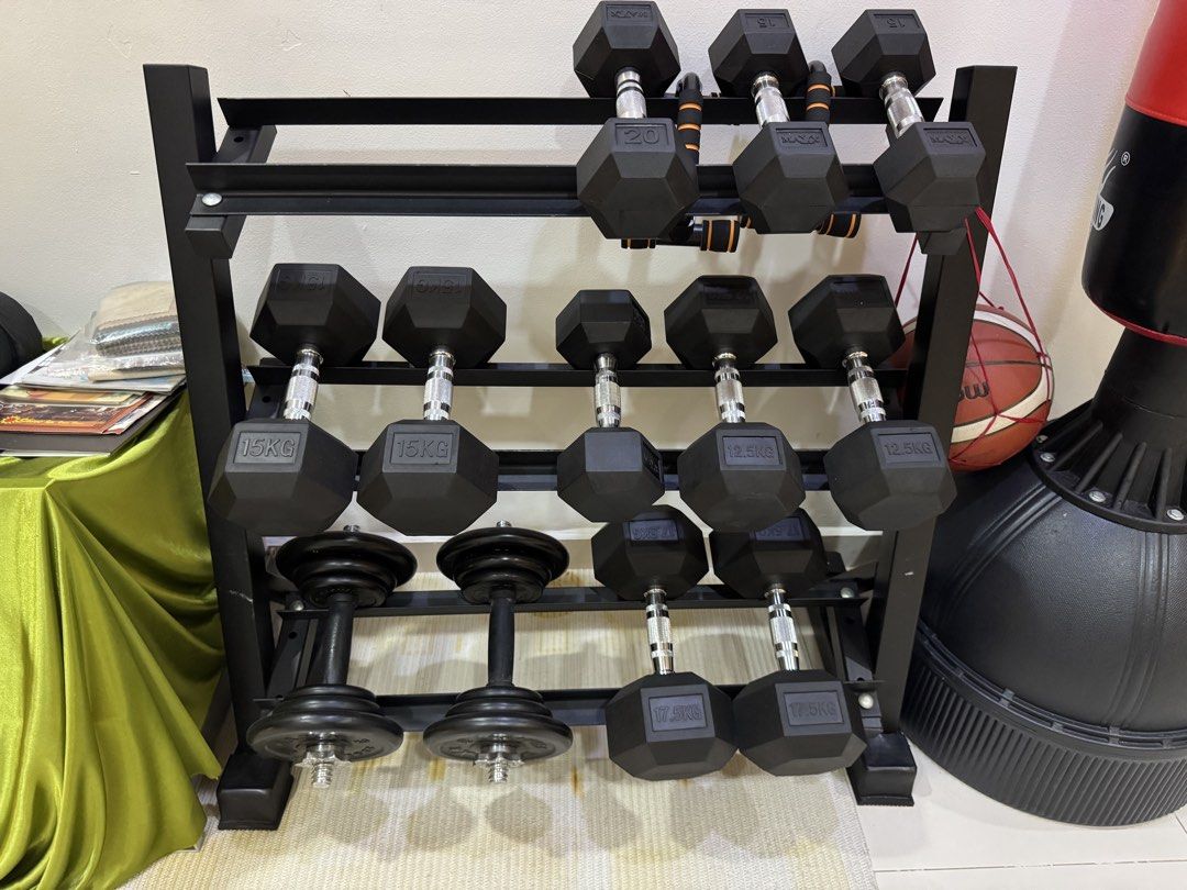 Dumbbell Rack (Category: Other Sports Equipment and Supplies) located in Kuala Lumpur. Submitted by khaiyuen98 (Listing ID 1448840947, Image 1). Description: - Sturdy black metal dumbbell rack - Multiple tiers for organized storage - Suitable for various dumbbell sizes and types - Helps keep your home gym tidy and accessible - Durable construction 98cm Width x 50cm Length x 93cm Height.