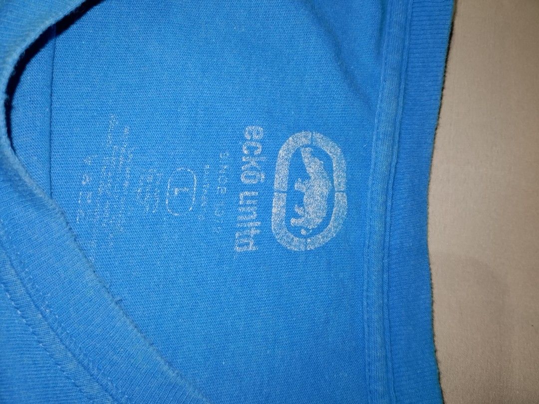 Ecko Unltd. Blue Graphic T-Shirt (Category: Tshirts & Polo Shirts ) located in Muntinlupa City. Submitted by jo_thrift2 (Listing ID 1448894144, Image 3). Description: - Blue Ecko Unltd. graphic t-shirt - Features iconic Ecko logo and 'Since 1972' text - Size: Large (L) - Perfect for everyday casual wear.