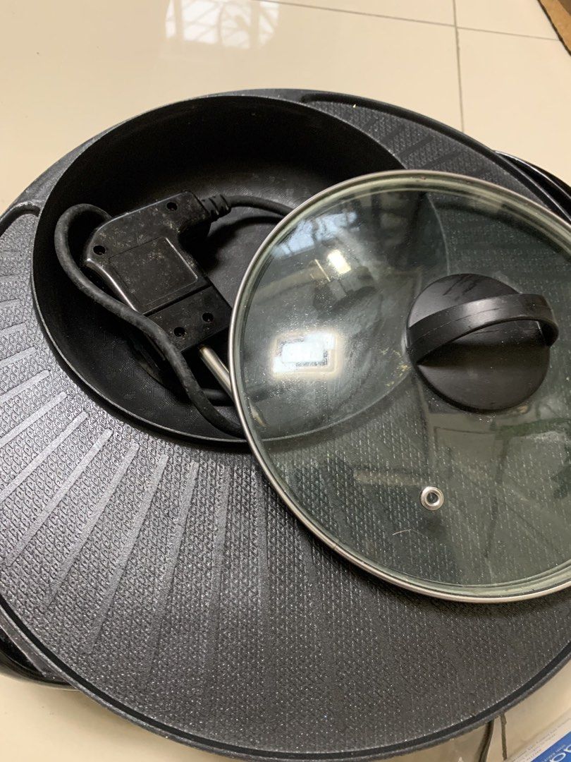 Electric Grill Pan with Lid (Category: Cookware & Accessories) located in Bulacan. Submitted by heartlove_holb (Listing ID 1448786407, Image 2). Description: - Versatile electric grill pan: perfect for BBQ and steamboat! - Comes with a convenient glass lid. - Features a non-stick surface for easy cooking and cleaning. - Power cord is included. - Ready to elevate your next gathering!.