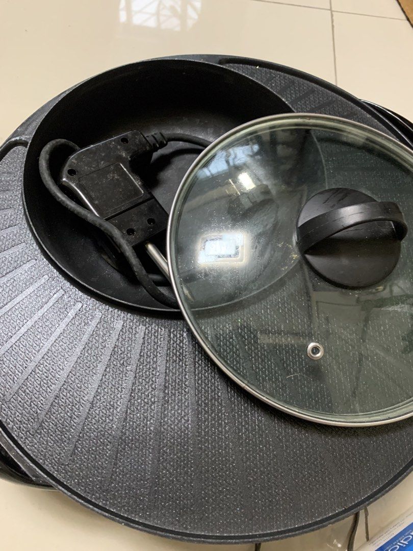 Electric Grill Pan with Lid (Category: Cookware & Accessories) located in Bulacan. Submitted by heartlove_holb (Listing ID 1448786407, Image 3). Description: - Versatile electric grill pan: perfect for BBQ and steamboat! - Comes with a convenient glass lid. - Features a non-stick surface for easy cooking and cleaning. - Power cord is included. - Ready to elevate your next gathering!.