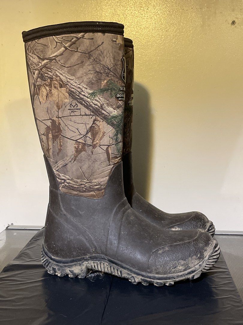 Field and Stream Waterproof River Boots (Category: Boots) located in Quezon City. Submitted by romsr (Listing ID 1448742704, Image 2). Description: - Bogs Neo-Classic boots - Camo pattern on top, black rubber on bottom - Insulated for warmth - Waterproof construction - Excellent grip on soles - Ideal for hunting, wet weather, or outdoor adventures.