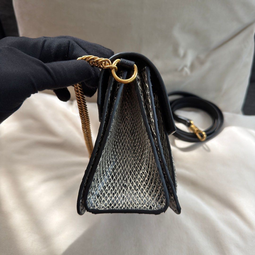 Givenchy GV3 Small Python Flap (Category: Bags & Wallets) located in Singapore. Submitted by yasfinds (Listing ID 1448764355, Image 3). Description: Givenchy GV3 Small Python Flap Like new Small L22 H15 D9cm Chain drop 18cm Strap drop 57cm Python/ Chèvre Leather Black / white Gold hardware Comes with dust bag, receipt and cites cert dated 2018 RTP: 5,390SGD F1906 Whats App: Kai @ +65 98263475.