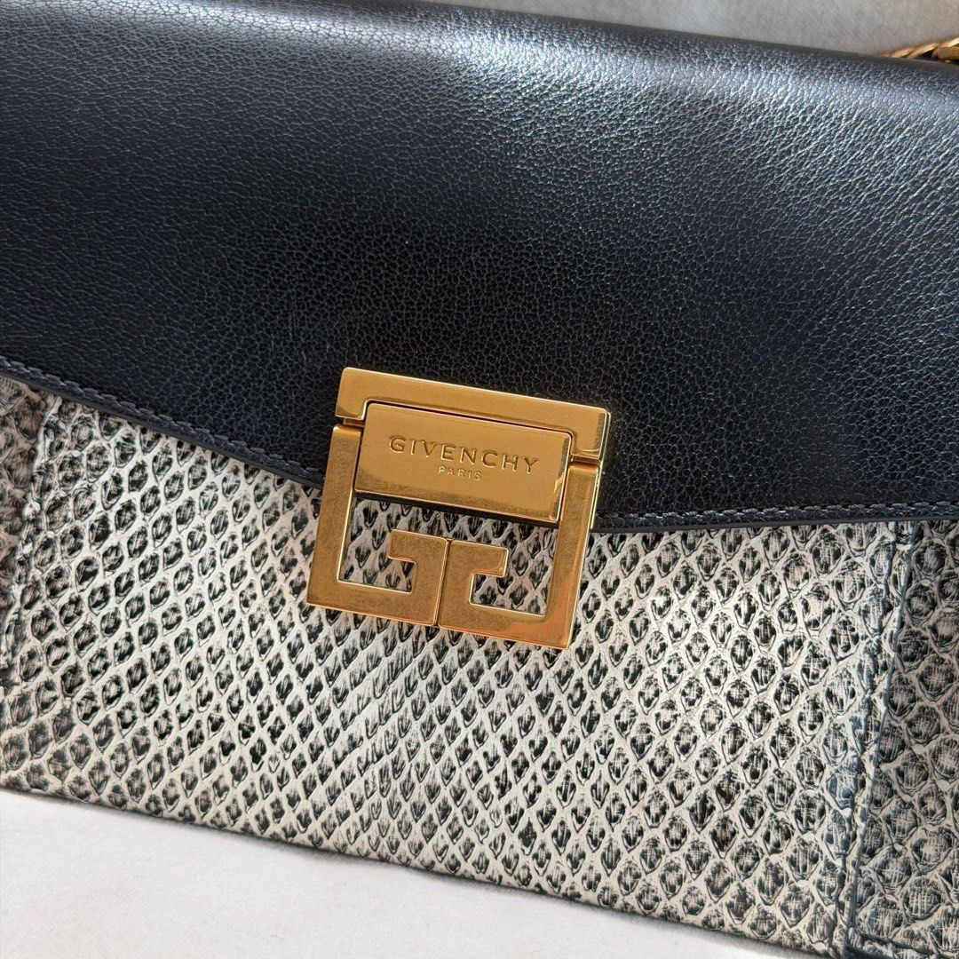 Givenchy GV3 Small Python Flap (Category: Bags & Wallets) located in Singapore. Submitted by yasfinds (Listing ID 1448764355, Image 2). Description: Givenchy GV3 Small Python Flap Like new Small L22 H15 D9cm Chain drop 18cm Strap drop 57cm Python/ Chèvre Leather Black / white Gold hardware Comes with dust bag, receipt and cites cert dated 2018 RTP: 5,390SGD F1906 Whats App: Kai @ +65 98263475.