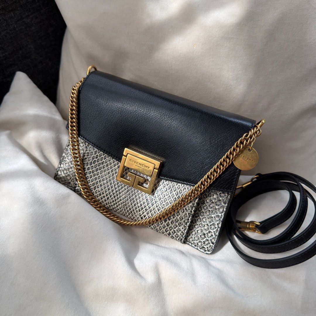 Givenchy GV3 Small Python Flap (Category: Bags & Wallets) located in Singapore. Submitted by yasfinds (Listing ID 1448764355, Image 1). Description: Givenchy GV3 Small Python Flap Like new Small L22 H15 D9cm Chain drop 18cm Strap drop 57cm Python/ Chèvre Leather Black / white Gold hardware Comes with dust bag, receipt and cites cert dated 2018 RTP: 5,390SGD F1906 Whats App: Kai @ +65 98263475.