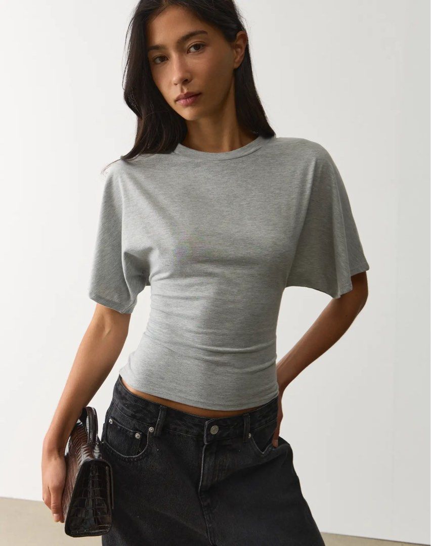 Glassons Cinched Short Sleeve Top (Category: Others Tops) located in Quezon City. Submitted by alimo13 (Listing ID 1448845668, Image 1). Description: Glassons Cinched Short Sleeve Top Size S Color: Pale Grey Marle BNWT. Bought directly from the Glassons site RFS: impulse buy.