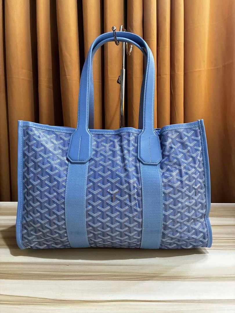 Goyard Villette Light weight floral inside (Category: Luxury Bags & Wallets) located in Quezon City. Submitted by kateykate12345 (Listing ID 1448851910, Image 3). Description: - Light blue Goyard tote bag - Classic Goyardine monogram pattern - Durable leather trim and handles - Unique floral print lining with butterflies - Spacious interior for all your essentials - Ideal for everyday errands or travel adventures - No guarantees but see the detai