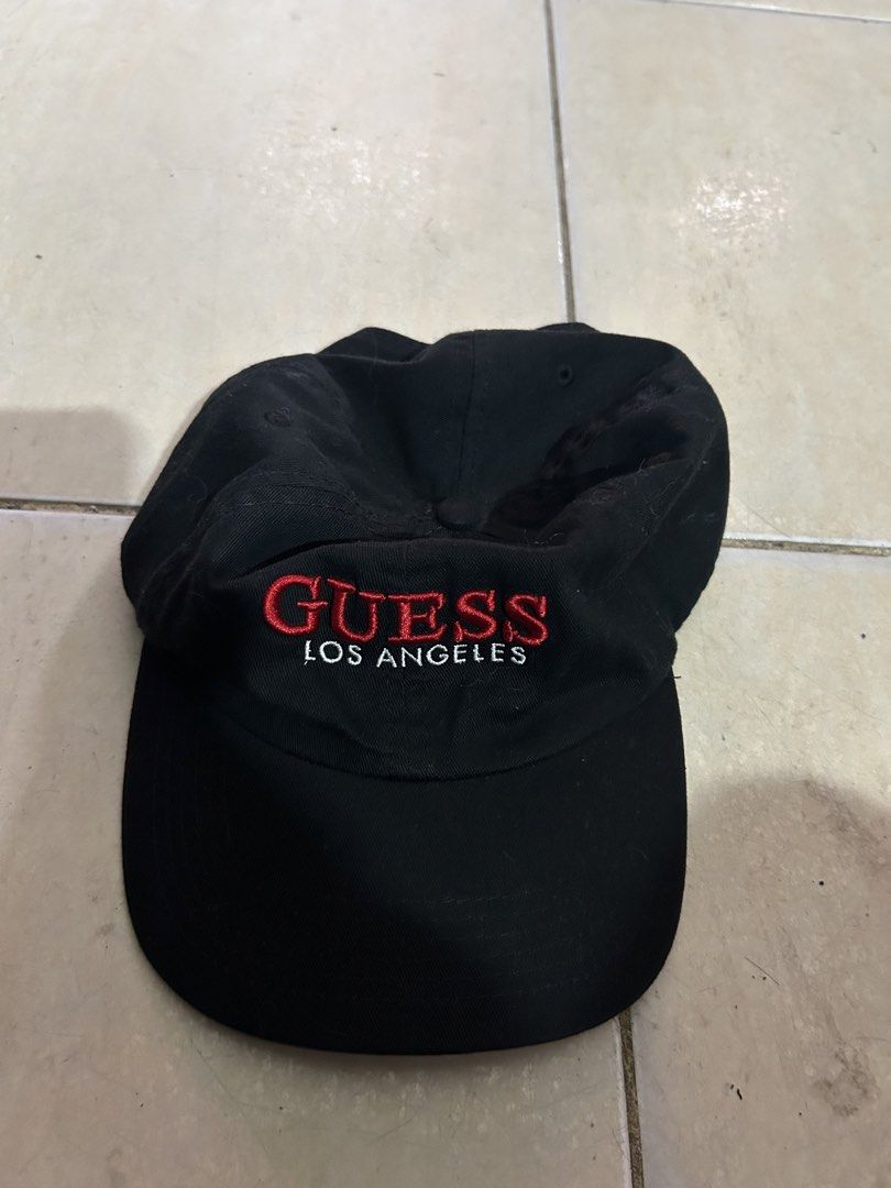 GUESS DAD HAT (Category: Caps & Hats) located in Quezon City. Submitted by lehitimo1985 (Listing ID 1448849123, Image 1). Description: .