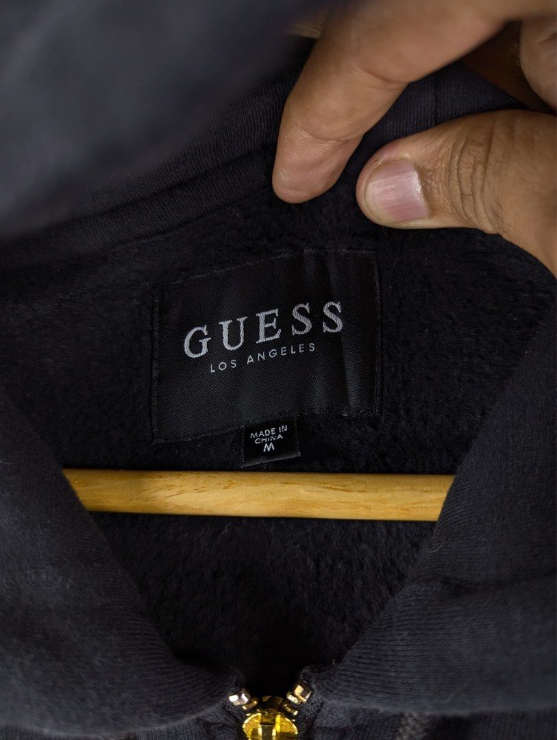 GUESS Los Angeles Zip-Up Hoodie (Category: Coats, Jackets and Outerwear) located in Kuala Terengganu. Submitted by zulcyyzo91 (Listing ID 1448757369, Image 3). Description: Pit 21 Labuh 30.5 Kondisi 8.9/10.
