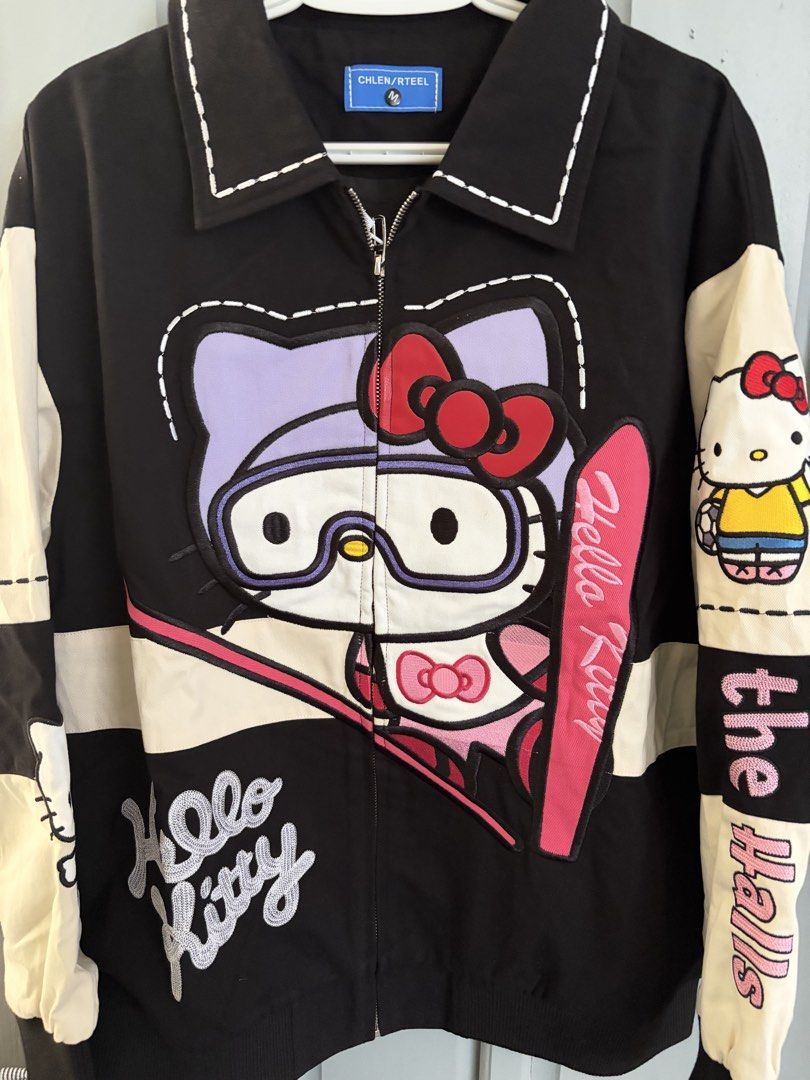 Hello Kitty Racer jacket (Category: Coats, Jackets and Outerwear) located in Rizal. Submitted by katmandulovesmakeup (Listing ID 1448715757, Image 2). Description: Bnew with tags Cute Hello Kitty racer jacket Embroidered design and cute hk sleeves details Navy blue Size medium - oversize fit.