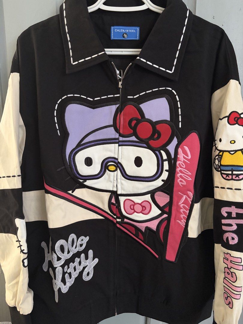 Hello Kitty Racer jacket (Category: Coats, Jackets and Outerwear) located in Rizal. Submitted by katmandulovesmakeup (Listing ID 1448715757, Image 1). Description: Bnew with tags Cute Hello Kitty racer jacket Embroidered design and cute hk sleeves details Navy blue Size medium - oversize fit.