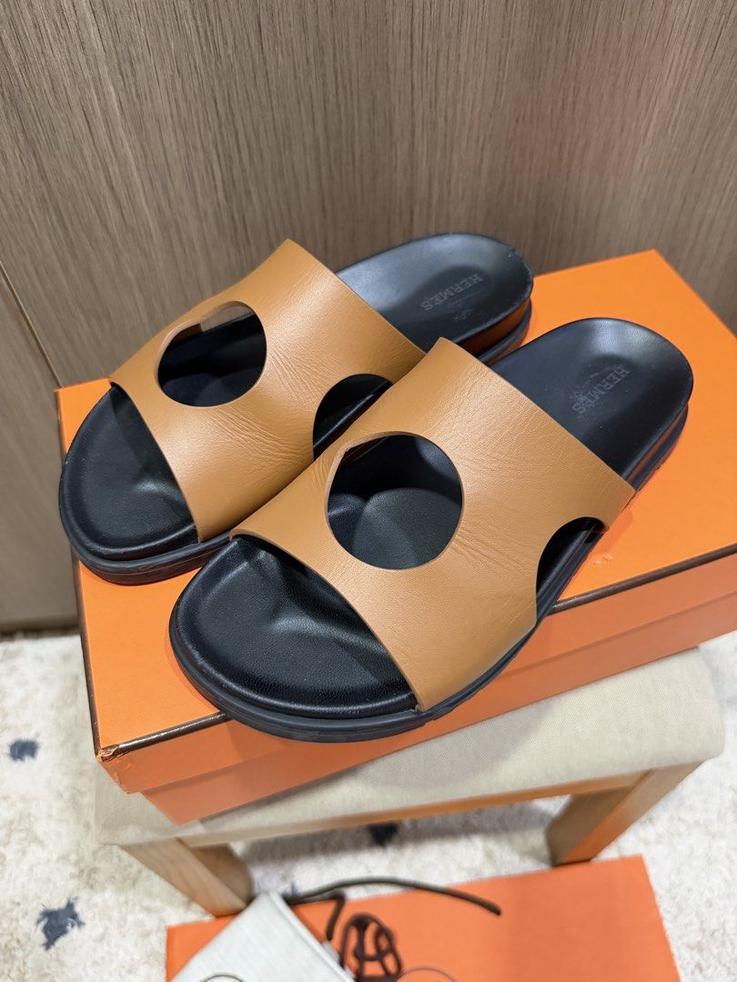 Hermes Edith Sandals sizs 38.5 Natural (Category: Sneakers & Footwear) located in Paranaque City. Submitted by dlp0830 (Listing ID 1448788988, Image 2). Description: This is an authentic pair of HERMES Calfskin Womens Edith Sandals size 38.5 in Naturel. These stylish sandals are crafted of leather in brown. They feature a toe strap across-over large Hermes H and an adjustable strap. Complete with two dustbags, paper bag and box. Rfs: Decluttering