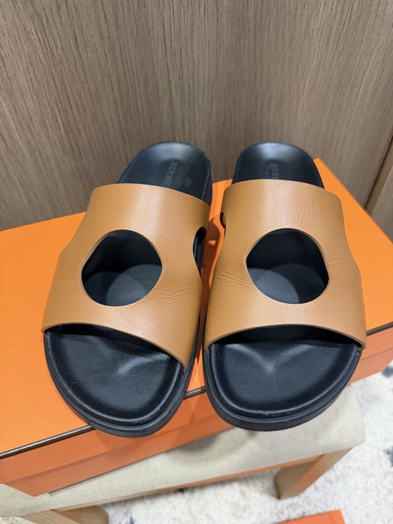 Hermes Edith Sandals sizs 38.5 Natural (Category: Sneakers & Footwear) located in Paranaque City. Submitted by dlp0830 (Listing ID 1448788988, Image 1). Description: This is an authentic pair of HERMES Calfskin Womens Edith Sandals size 38.5 in Naturel. These stylish sandals are crafted of leather in brown. They feature a toe strap across-over large Hermes H and an adjustable strap. Complete with two dustbags, paper bag and box. Rfs: Decluttering
