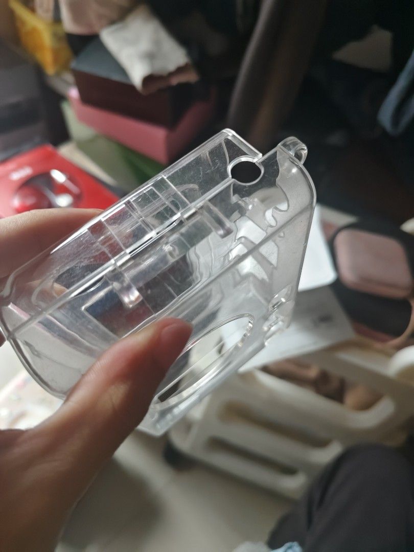 Instax Mini Evo Clear Case (Category: Camera Bags & Carriers) located in Makati City. Submitted by rrraiii (Listing ID 1448843271, Image 2). Description: issue: nawala ung isang clip but still can use naman (see photo).