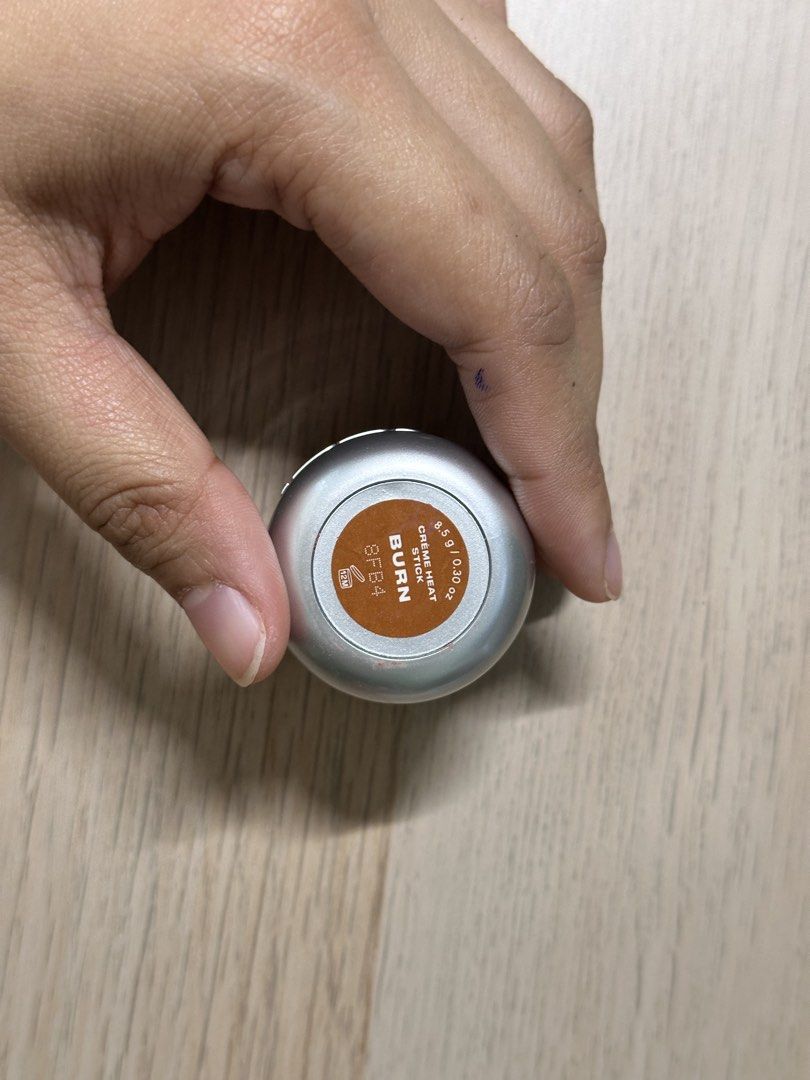 Issy Creamy Heat Stick - Burn (Category: Makeup) located in Taguig. Submitted by mandms09 (Listing ID 1448736393, Image 1). Description: - Issy Creamy Heat Stick - Shade: Burn (warm, bronzy-orange) - Type: Cream blush stick - Effect: Adds a natural flush to cheeks - Size: 5.5g / 0.19 oz - Features: Compact and portable.