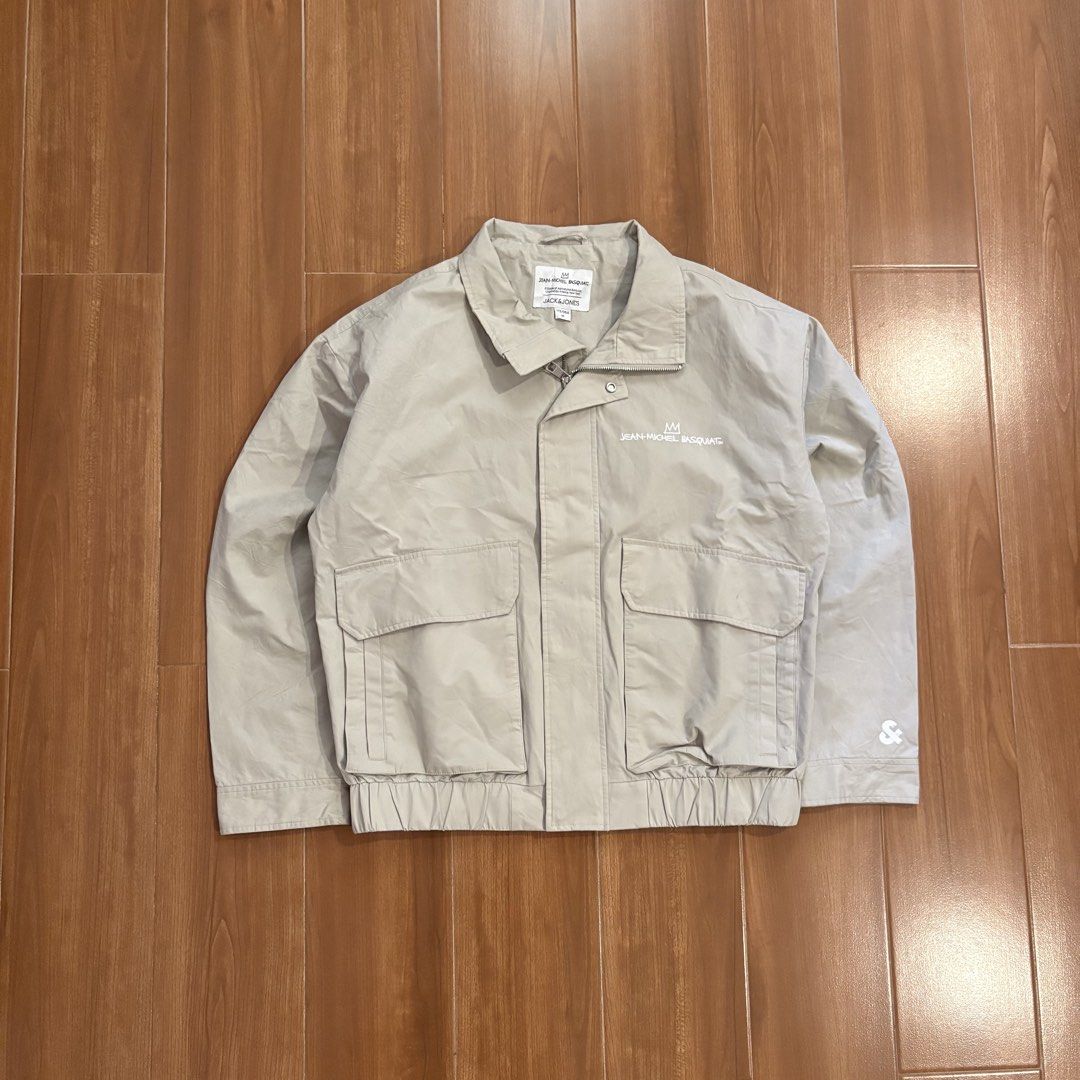 Jean-Michel Basquiat Multi Pocket Jacket (Category: Coats, Jackets and Outerwear) located in Iloilo. Submitted by thriftheaven001 (Listing ID 1448765546, Image 1). Description: Item name: Jean-Michel Basquiat Multipocket Jacket Size: Boxy Large Dimes (LxW): 26 x 24.5 Condition: 9.3/10 Issue: small stain .