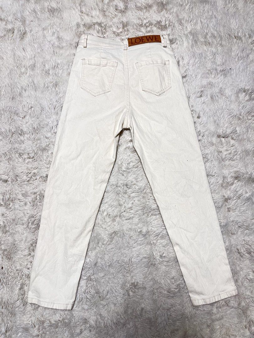 Loewe Cream Denim Jeans Size 26 (Category: Jeans) located in General Santos City (Dadiangas). Submitted by crisjayg (Listing ID 1448705280, Image 2). Description: - Authentic Loewe cream denim jeans - Iconic Anagram logo embroidered on front pocket - Leather patch with Loewe branding on the back - Classic straight leg fit - Waist size: 26 - Made in China.