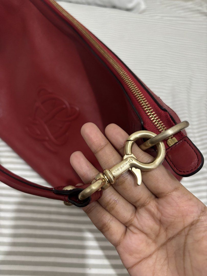 Louis Quatorze Shoulder/Sling Bag (Category: Cross-body Bags) located in Valenzuela. Submitted by melizza.ph (Listing ID 1448763146, Image 3). Description: This is my most beautiful looking bag. Bought it unused, i am basically the first hand user. 2 straps No flaws Prestine condition Super sulit nito. Yung pagka red nya di masakit sa mata. Hardwares are in really good condition. leather is perfect Rfs: need funds Please manage expectations as th