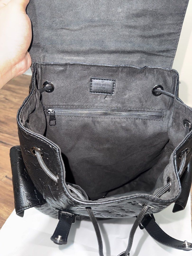 Louis Vuitton Black Monogram Leather Backpack (Category: Luxury Bags & Wallets) located in Cabuyao City. Submitted by lakasngthrift23 (Listing ID 1448829682, Image 3). Description: - Louis Vuitton backpack - Color: Black - Material: Embossed Monogram Leather - Exterior pockets for easy access - Interior drawstring closure with flap top - Adjustable shoulder straps - Ideal for everyday use and travel.