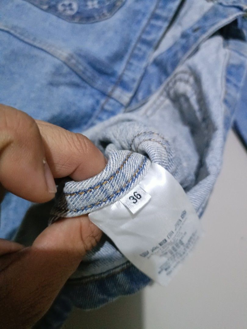 Louis Vuitton Monogram Denim Jacket (Category: Luxury Apparel) located in Angeles City. Submitted by jcarino_1822 (Listing ID 1448797846, Image 3). Description: - Iconic LV monogram denim jacket - Size: 36 - Multiple functional front pockets - Engraved LV logo buttons - Perfect addition to any designer collection.