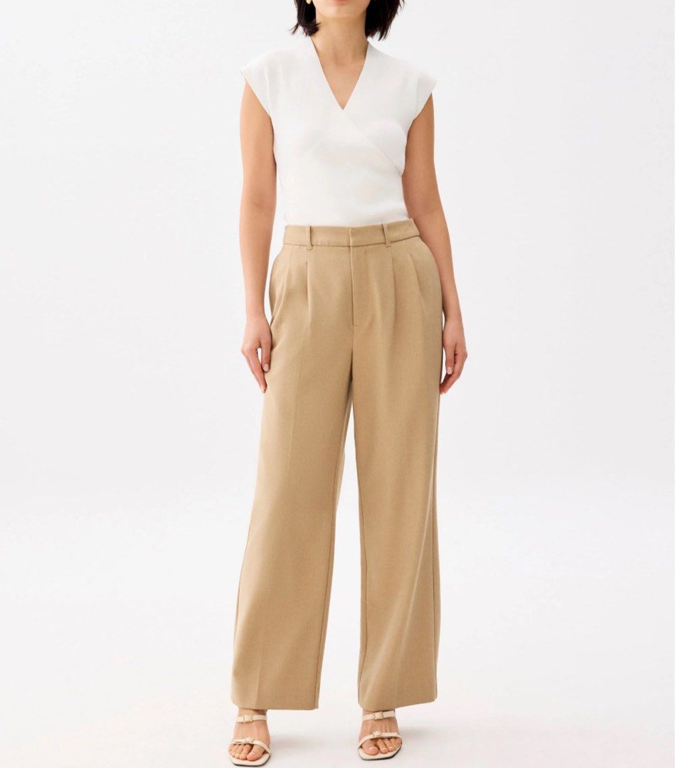 Love, Bonito Tailored Pants (sz 26) (Category: Other Bottoms) located in Makati City. Submitted by ma_rose (Listing ID 1448835609, Image 3). Description: Decluttering! Love Bonito tailored pants Waist inches: 26 (best fits 26-27 waist) Perfect for work and for casual wear Used 2x only, very good condition ₱450 + SF Loc: Marikina - Beige wide leg pants from Love, Bonito - High-waisted with belt loops - Tailored look with front pleats - Convenient 
