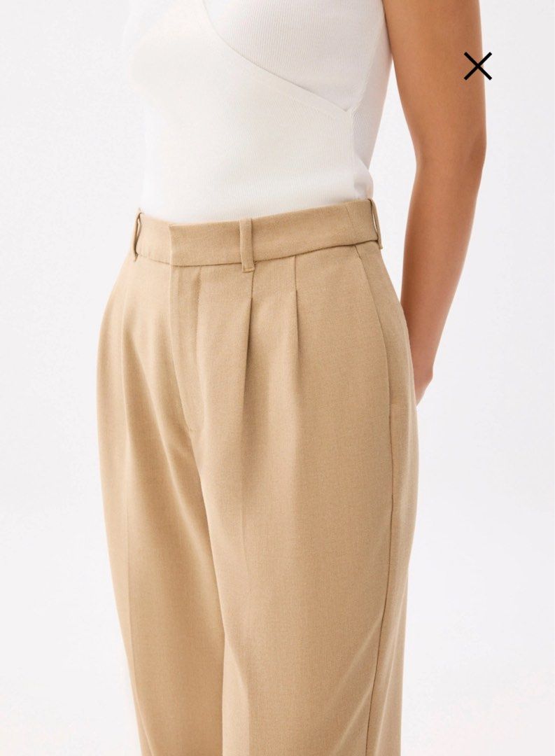 Love, Bonito Tailored Pants (sz 26) (Category: Other Bottoms) located in Makati City. Submitted by ma_rose (Listing ID 1448835609, Image 2). Description: Decluttering! Love Bonito tailored pants Waist inches: 26 (best fits 26-27 waist) Perfect for work and for casual wear Used 2x only, very good condition ₱450 + SF Loc: Marikina - Beige wide leg pants from Love, Bonito - High-waisted with belt loops - Tailored look with front pleats - Convenient 