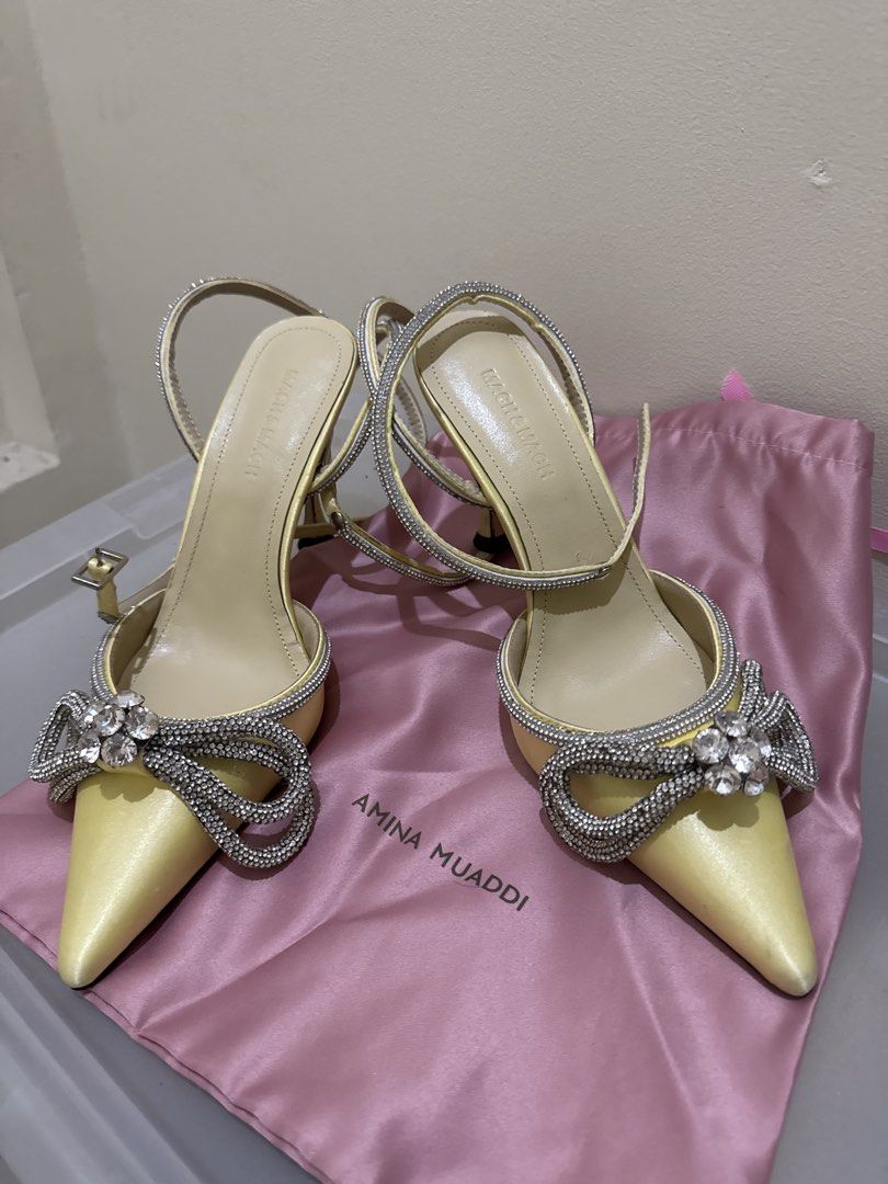 Mach & Mach Yellow Crystal Bow Heels Size 41 (Category: Heels) located in Quezon City. Submitted by elektra0111 (Listing ID 1448831648, Image 1). Description: - Elegant yellow satin heels - Dazzling crystal bow detail - Secure ankle strap closure - Crafted in Italy - Heel height: approximately 3-4 inches - Perfect for parties and special occasions - best fit for size 8.