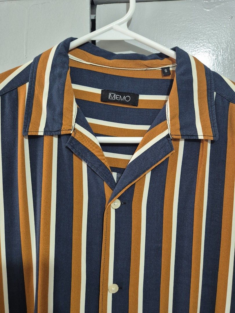MEMO Striped Button-Up Shirt (Small, Loose Fit) (Category: Tshirts & Polo Shirts ) located in Mandaluyong City. Submitted by randombro (Listing ID 1448860539, Image 2). Description: Decluttering sale Memo striped button up shirt Size: Small (but large/loose fit) For reference: I'm 5'7, 68kg and sakto lang fit nito sakin MOP: Gcash / Bank Transfer MOD: Lalamove /LBC My location: Mandaluyong city Shipping fee c/o buyer.