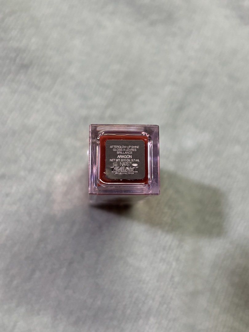 Mini NARS Afterglow Lip Oil (Category: Makeup) located in Navotas City. Submitted by peetamellark16 (Listing ID 1448836279, Image 2). Description: Shade: Aragon Purchased: End of 2024.