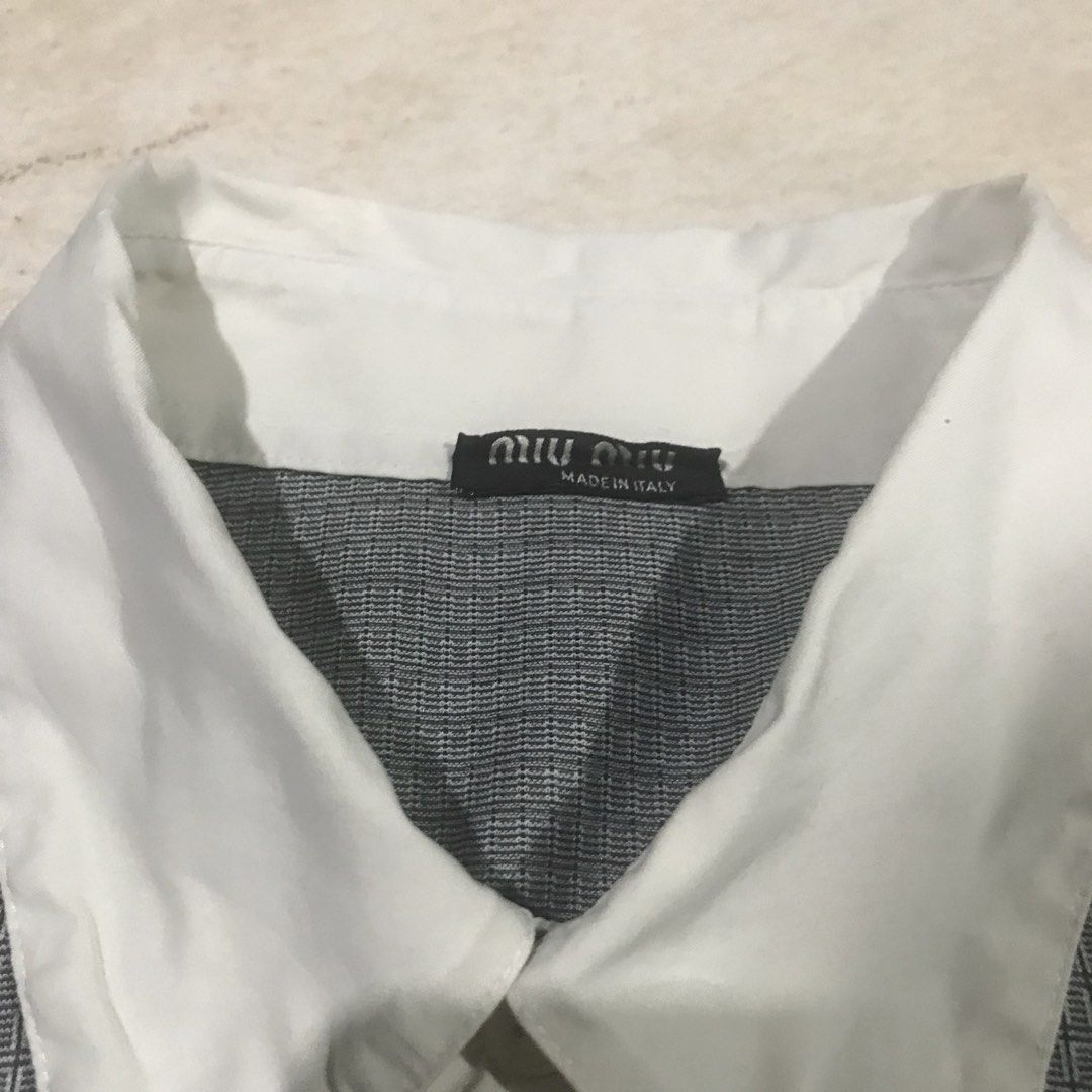 Miu Miu Polo Shirt (Category: Tshirts & Polo Shirts ) located in Bacolod City. Submitted by cdargg (Listing ID 1448832152, Image 3). Description: •Size: Large •Dimension: Width: 20 Length: 29 •Excellent •No Issue/Flaws •9.5/10 Color Rate •Authentic.