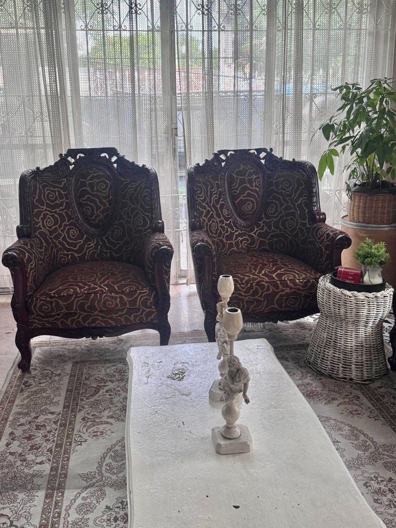 Narra Sofa with tables (Category: Sofas) located in Caloocan City. Submitted by momeelez.qualitypreloved (Listing ID 1448709763, Image 2). Description: - Elegant Narra Sofa set with matching tables. - Features a classic, ornate design. - includes 1 center table and 2 side tables - Upholstered in a rich, patterned fabric. - Includes one sofa and two armchairs. - Spacious seating arrangement. - Perfect for adding a touch of sophistication to your l