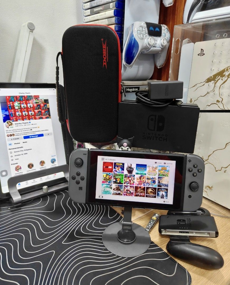 Nintendo Switch V2 Gray with Free Games (Category: Nintendo) located in Manila. Submitted by nswitchgear (Listing ID 1448747752, Image 1). Description: Nintendo Switch V2 with Free Games ₱8,499 FREE acess to my Paid games Legit purchase not Jailbreak. Used item but in Good/Best condition Can give 7 Days personal Warranty for peace of mind. -Doon po tayo sa kaya tayong issupport, dont settle for less. Comes with Pouch, Dock,charger,grips,hdmi. Any