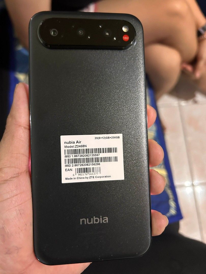 Nubia Air 5G (Category: Android Others) located in Manila. Submitted by genusbayer22376 (Listing ID 1448722719, Image 3). Description: Model: Nubia Air 5G Network: 5G Storage: 256GB RAM: 8+12GB Display: 6.7-inch AMOLED, 120Hz refresh rate Processor: T8300 Octa-core Max 2.2GHz Rear Camera: 50MP AI Dual Camera Front Camera: 16MP Selfie Camera Battery: 5,000mAh Charging: 33W Fast Charging Operating System: Android Security: In-display Fingerprint Sc