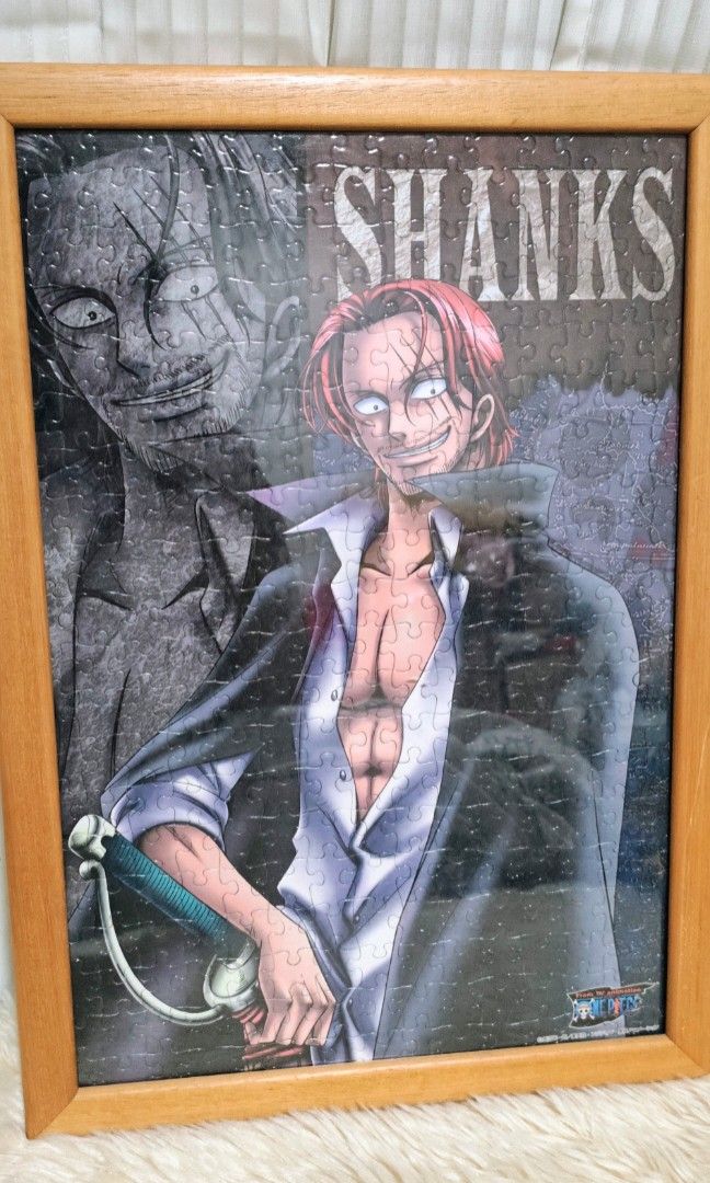 ONE PIECE PUZZLE FRAME (FEAT: SHANKS) (Category: Art & Prints) located in Manila. Submitted by yourfavoritethings7 (Listing ID 1448816251, Image 2). Description: The Captain of the Red Hair Pirates and one of the most powerful pirate ruler in the world. Dimensions: 11 x 16 inches.