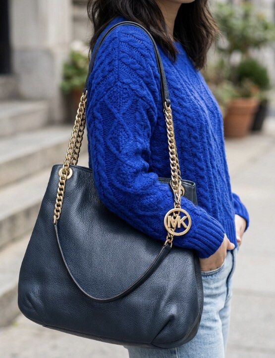 Original Michael Kors MK Slouchy Shoulder Bag (Category: Luxury Bags & Wallets) located in Manila. Submitted by rshay (Listing ID 1396796399, Image 1). Description: 🛍ALL MUST GO! Prices are negotiable, just make an offer! 🛍Preloved; looks new condition; medium-large size; gold hardwares; super nice in actual 🎀 All items are personal preloved unless stated as brand new/never used. Please manage your expectation as this item is preloved. 🎀Other
