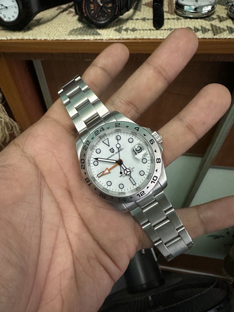 Pagani Design GMT automatic (Category: Watches) located in Ayer Molek. Submitted by danialxkj (Listing ID 1448812807, Image 1). Description: Pagani Design Automatic Watch - Condition 9/10, bracelet sahaja nampak kesan pemakaian - Full set sekali box - Movement seiko NH34 GMT fuction - Homage GMT Master ii.