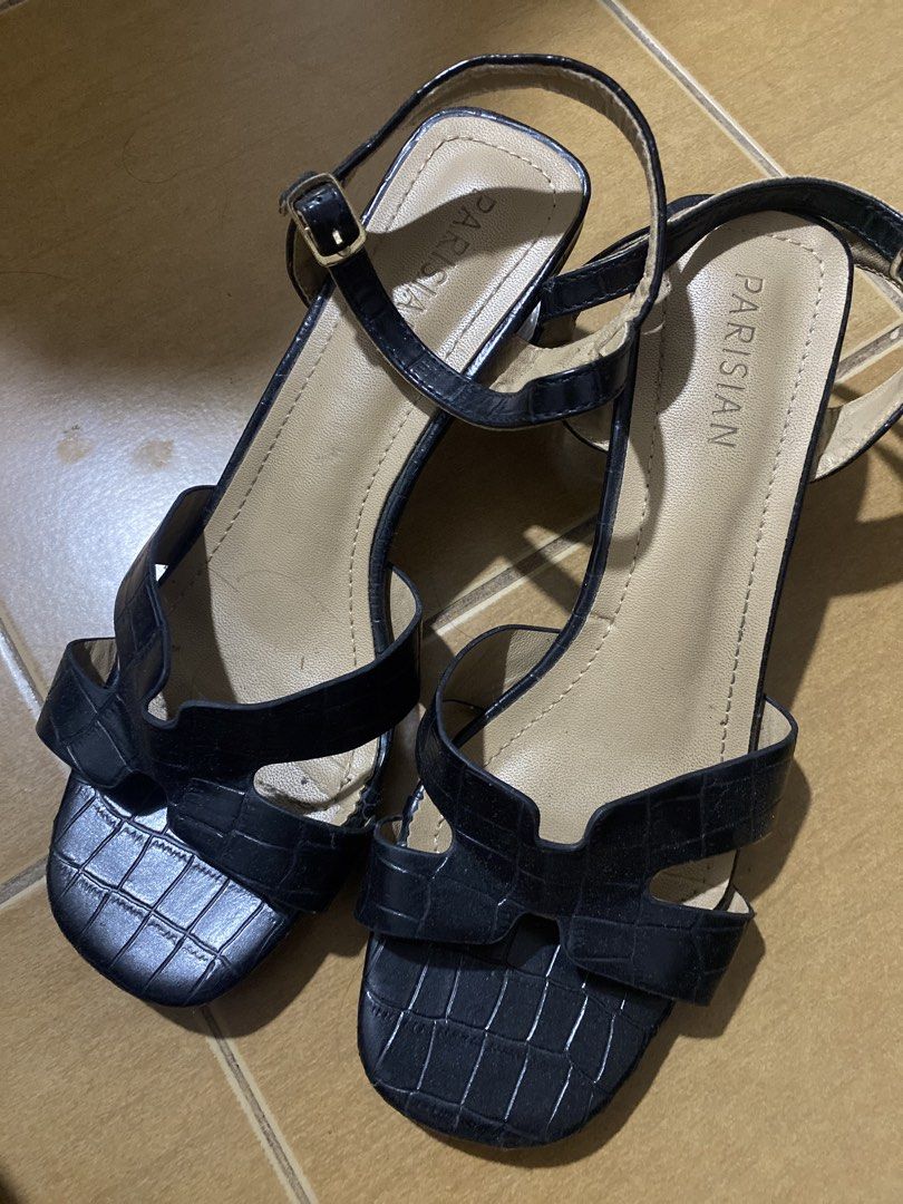 PARISIAN Black Croc-Embossed Heeled Sandals (Category: Flats & Sandals) located in Makati City. Submitted by msclosetcleanup (Listing ID 1448718498, Image 1). Description: - Chic black heeled sandals by Parisian. - Elegant croc-embossed detail on toe strap and heel. - Secure and adjustable ankle strap with buckle closure. - Versatile design perfect for various occasions. - Comfortable and stylish for everyday wear..