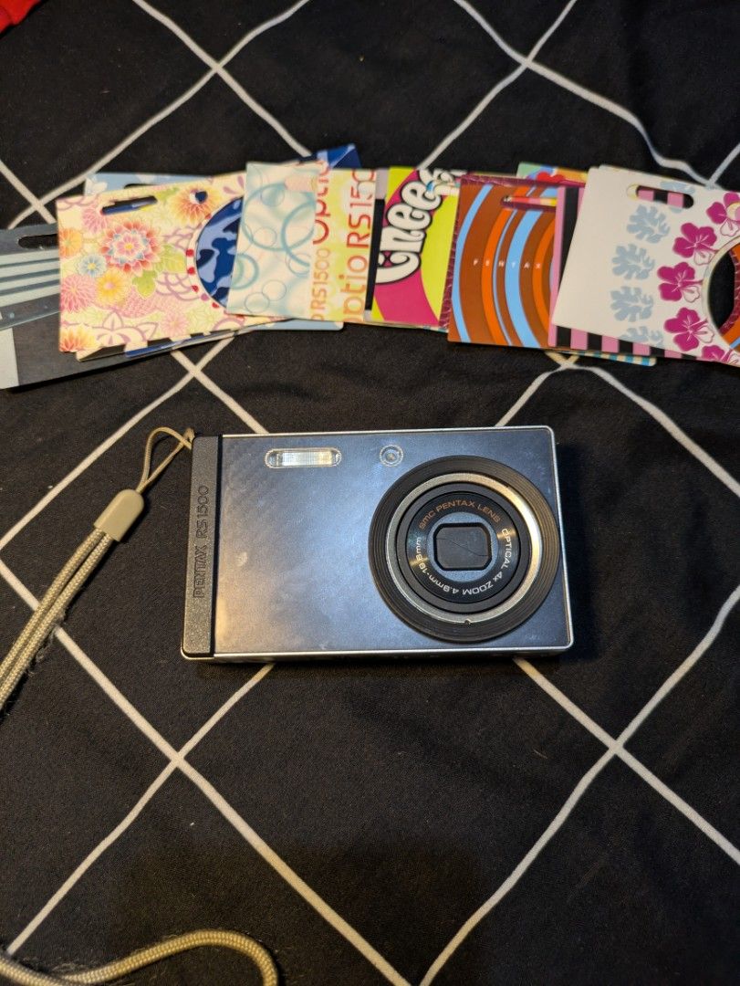 Pentax Optio RS1500 Digital Camera with Custom Skins (Category: Cameras) located in Quezon City. Submitted by stuff.decluttered (Listing ID 1448821274, Image 3). Description: 📷 [SECOND HAND] Pentax Optio RS1500 💌 Price: ₱6199 ✨ A rare customizable digicam that lets you match your camera with your outfit or aesthetic. ✨ Fully Working ✨ Buttons, zoom, and flash are functional ✨ Body Cosmetics: 10/10 ✅ 14.0 Megapixel ✅ 4x Optical Zoom ✅ Customizab