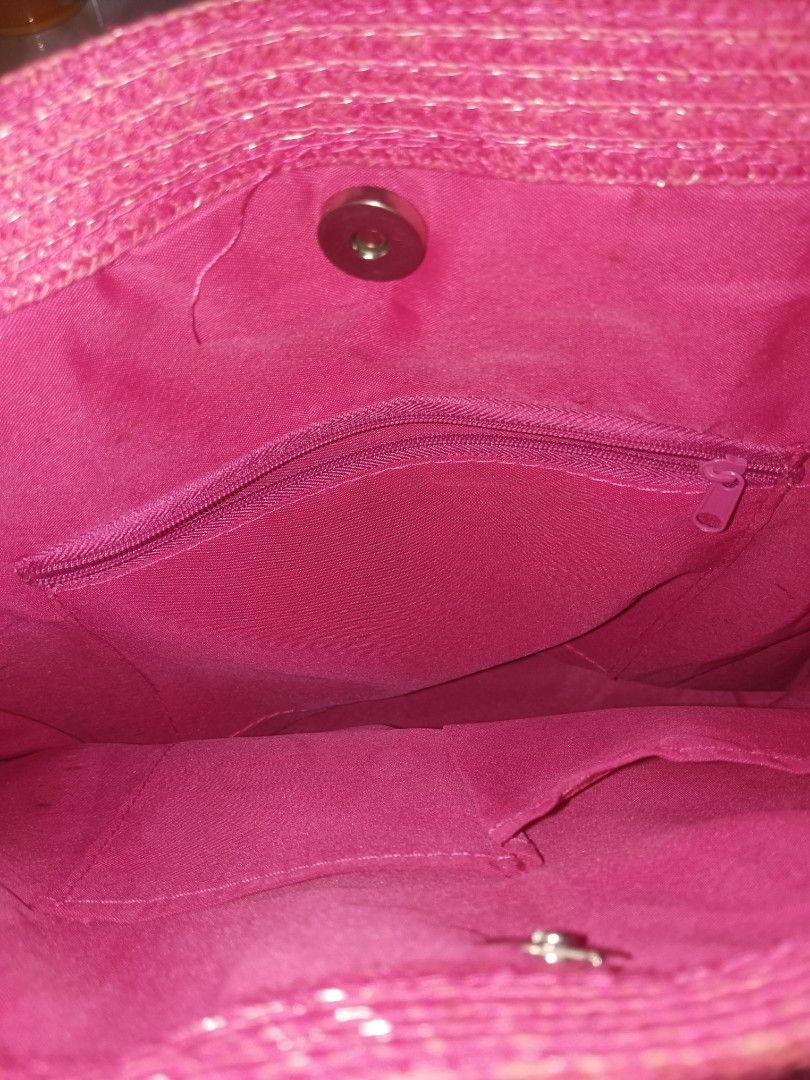 Pink Woven Tote Bag with Metal Studs (Category: Tote Bags) located in Quezon City. Submitted by cxthsells (Listing ID 1448817124, Image 3). Description: - Adorable pink woven tote bag - Features a sparkly thread woven into the material - Secure magnetic snap closure - Interior includes a zippered pocket and two slip pockets - Four metal studs on the bottom to protect the bag's base - Matching woven handles - Ideal for everyday use.